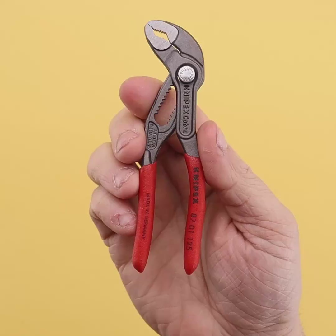 Load video: Knipex 5" Cobra Pliers - Plastic Grip